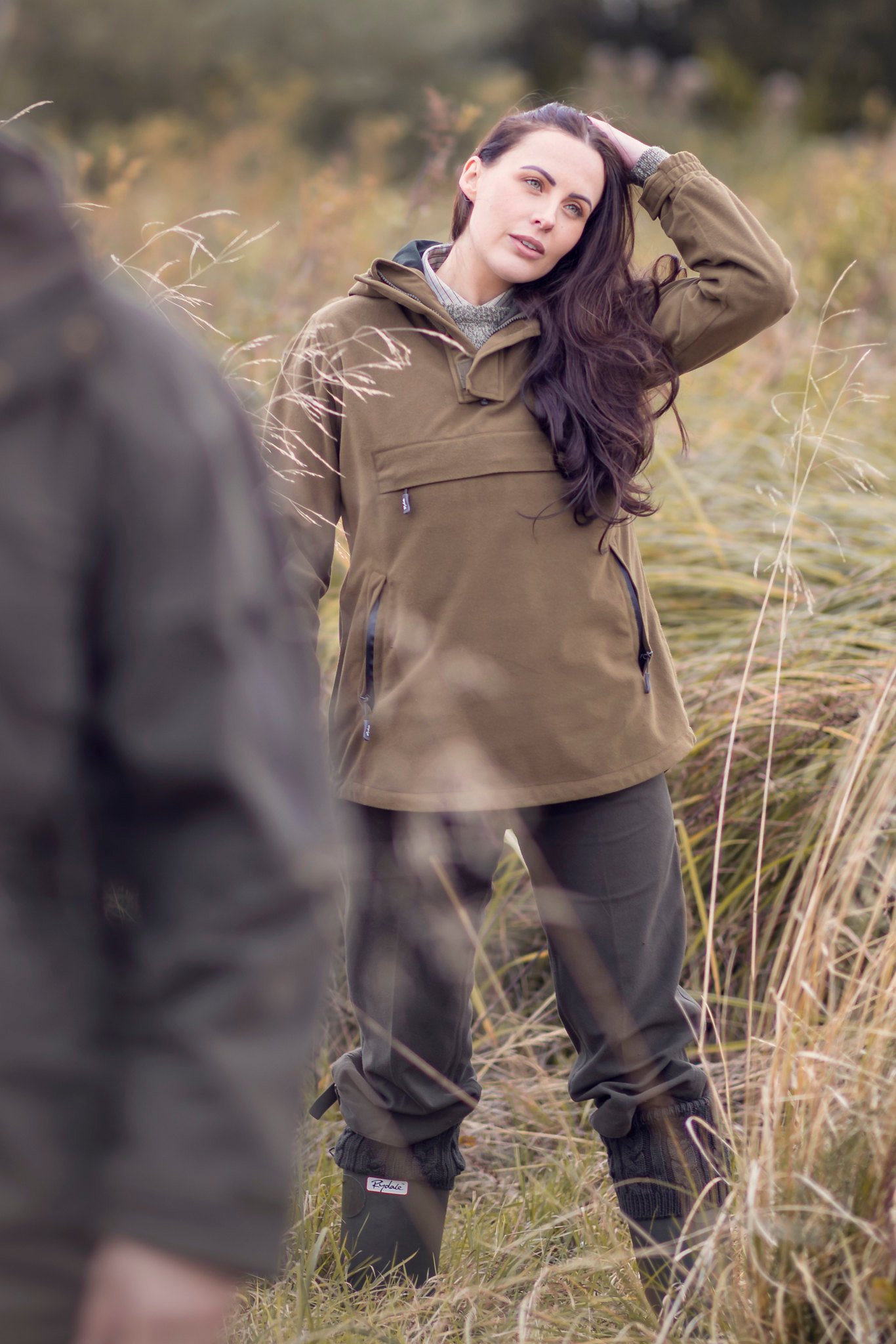 lady wearing a smock with shooting trousers.