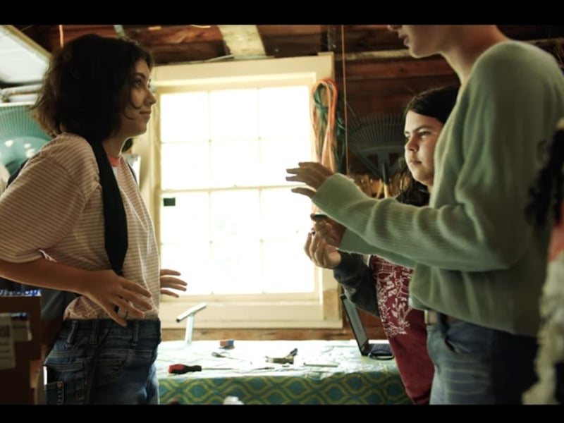 A scene in the series in which the students are gathered in the garage and realize they have a strange new material.