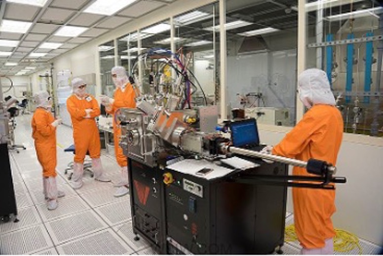 Semiconductors@Birck VIP students receiving training on a deposition tool inside Birck Center’s cleanroom. 