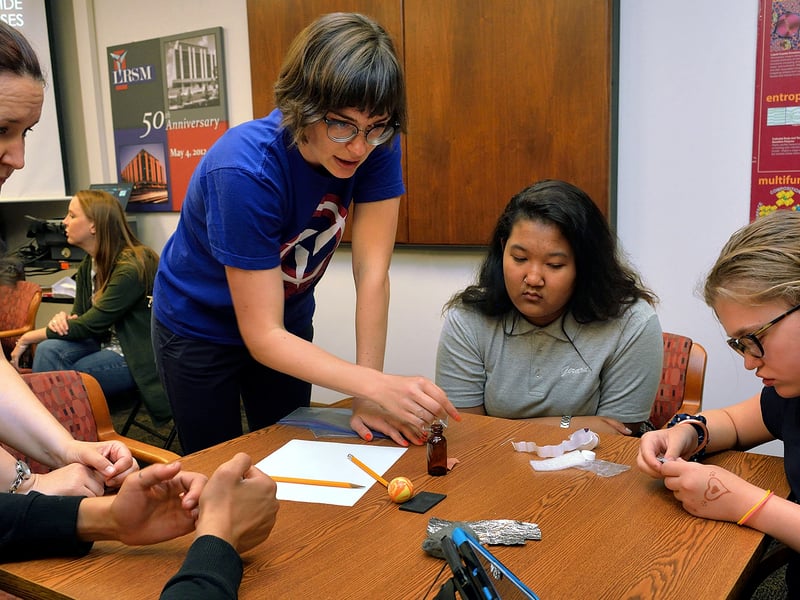 Sophia Siefert  working with students from Girard College and Pennsylvania School for the Deaf as they explore different types of materials. Image source: © Felice Macera