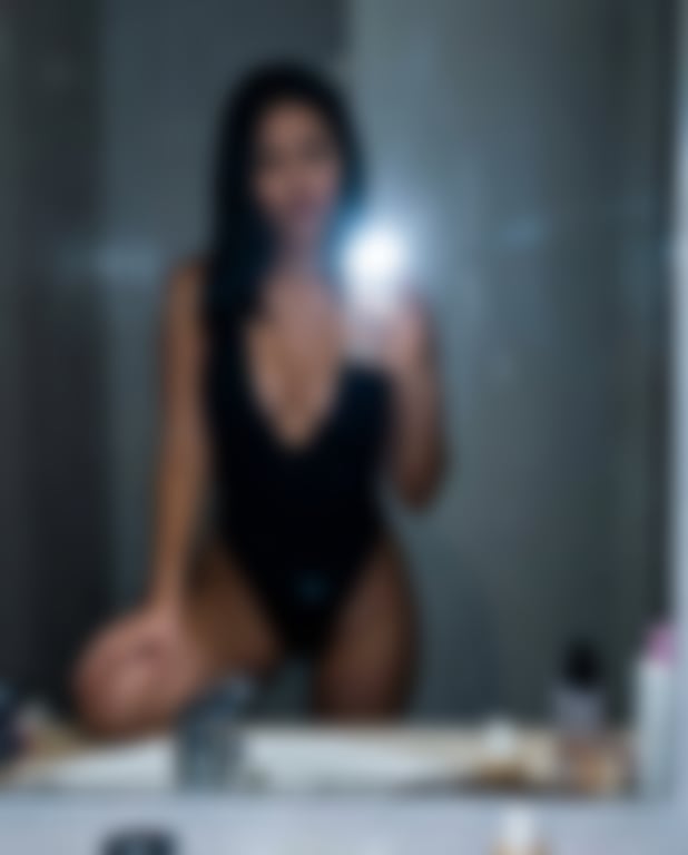 Hyper-realistic IG Baddie Bathroom Mirror Selfie (Flash) - AI generated image using Nano Banana Pro prompt