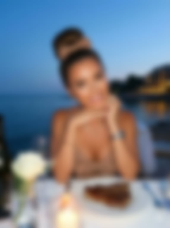 Luxury seaside hotel terrace portrait prompt - Blurred AI generated image using Nano Banana Pro prompt