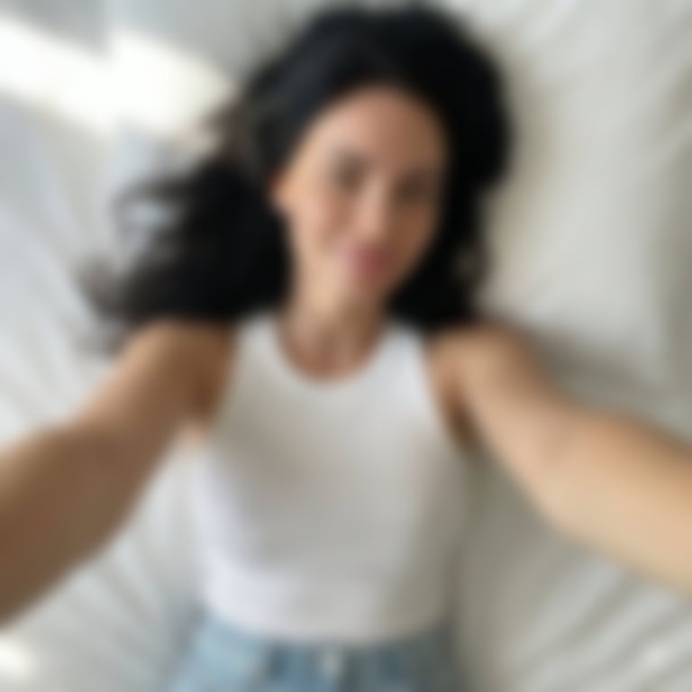 JSON selfie-on-bed prompt for Nano Banana Pro - Blurred AI generated image using Nano Banana Pro prompt