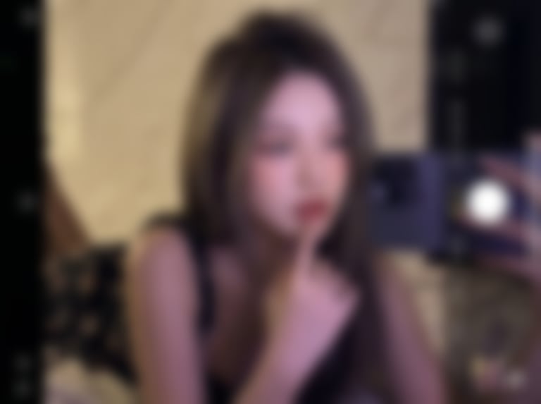 Ultra-realistic 16K selfie edit of a daydreaming girl on a blanket - Blurred AI generated image using Nano Banana Pro prompt
