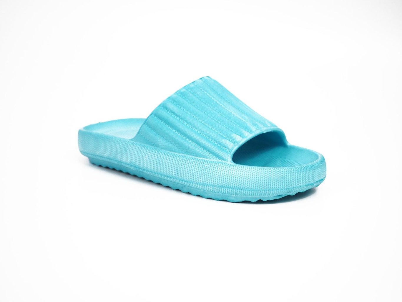 Aqua Ribbed Eva Slide Slipper For Women - Quality Leather Product Manufactured By Trizone Tedarik Kozmetik Dış Ticaret Ve Pazarlama A.ş.. Contact For B2B Orders.