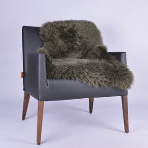 Luxurious Olive Green Sheepskin Decor Throw - Quality Leather Product Manufactured By Dabbagh Deri̇ Teks. San. Ti̇c. Ltd. Şti̇. Contact For B2B Orders.