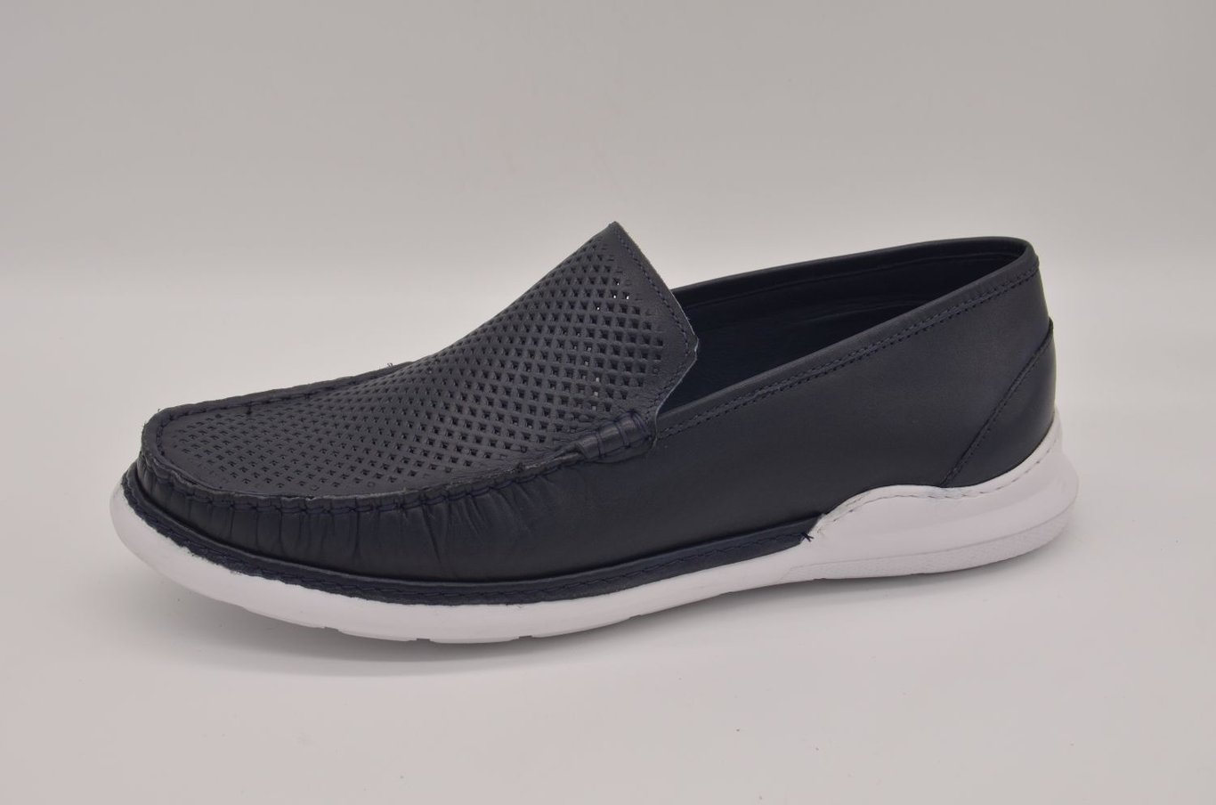 Elegant Navy Perforated Leather Men's Slip On Loafer - Quality Leather Product Manufactured By Çetsan Ayakkabı Sanayi Ve Ticaret Limited Şirketi. Contact For B2B Orders.