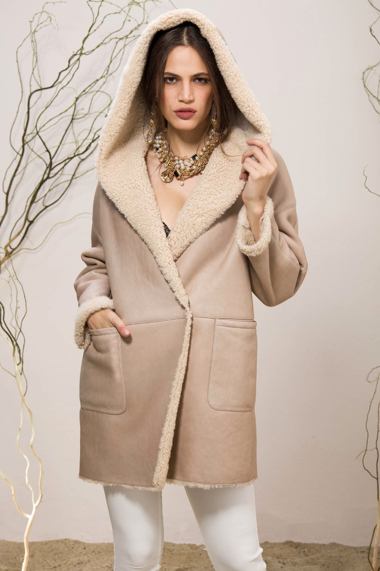 Elegant Nude Beige Shearling Hooded Long Coat - Quality Leather Product Manufactured By Emelda Deri Konfeksiyon Turizm Insaat Sanayi Ve Dis  Ticaret Anonim Sirketi. Contact For B2B Orders.