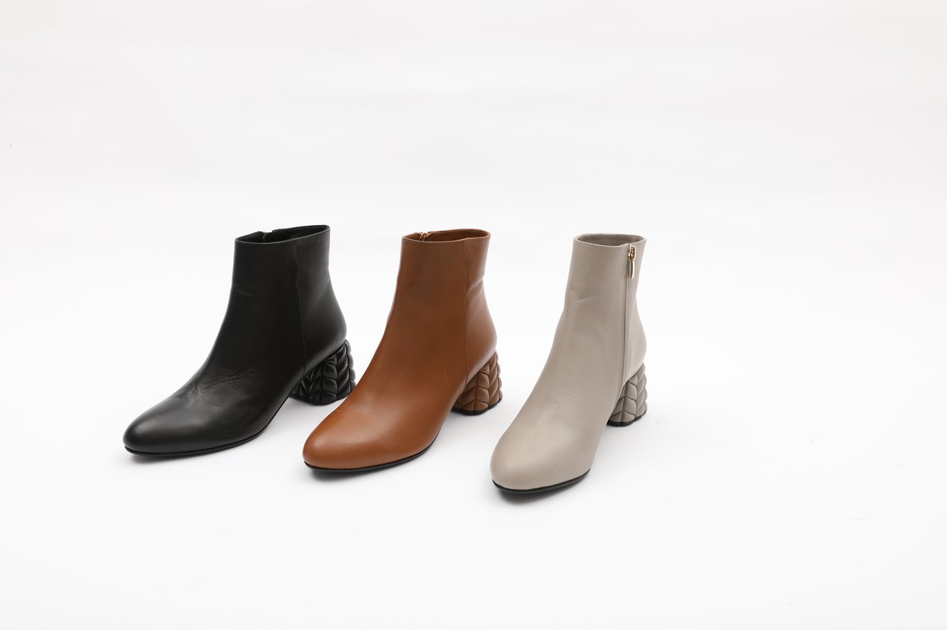 Elegant Leather Ankle Boots Unique Heel Design - Quality Leather Product Manufactured By Özkan Moda Tasarim San Ve Ti̇c Ltd. Şti̇.. Contact For B2B Orders.