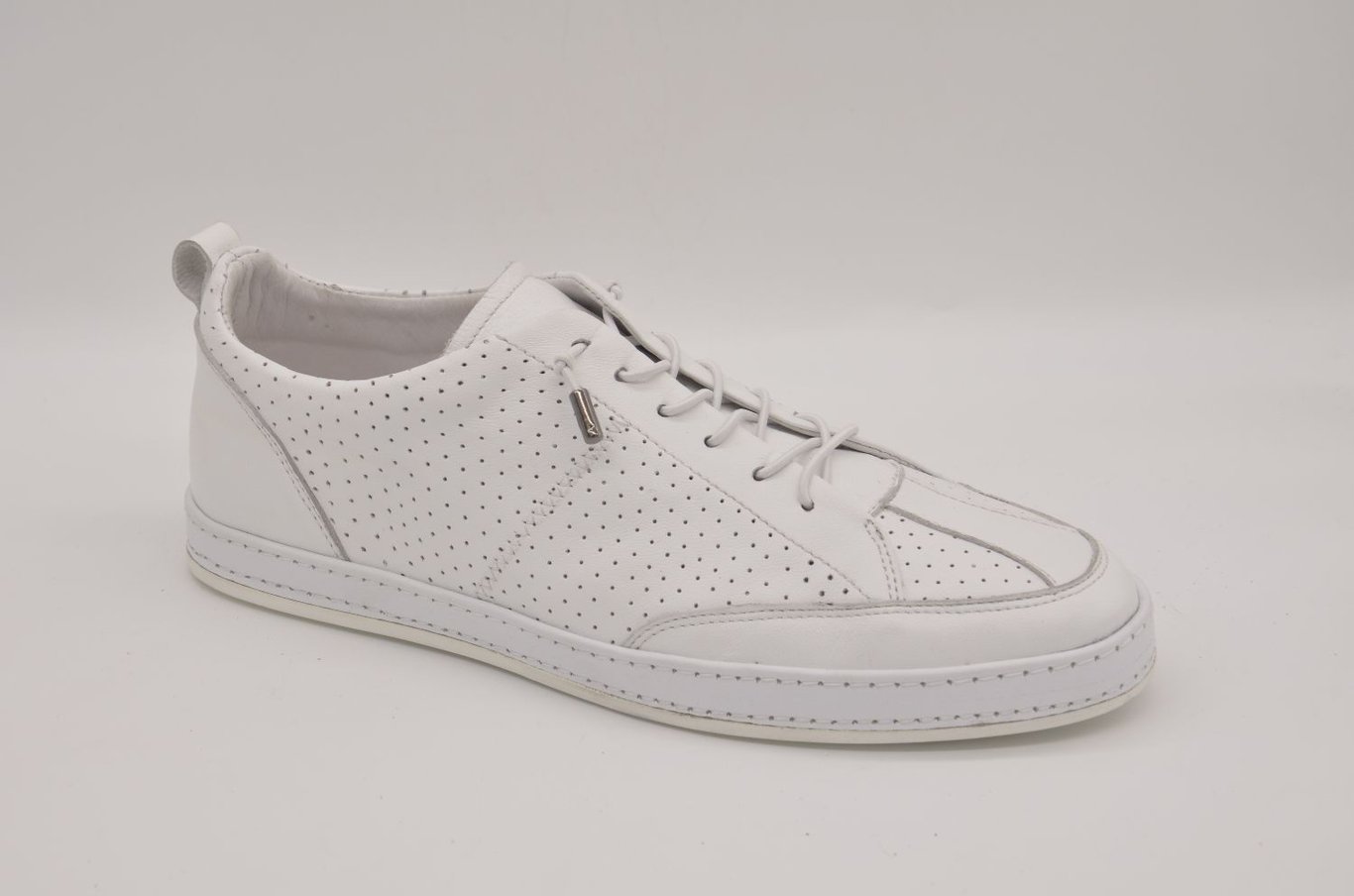 Elegant Perforated White Leather Men's Sneaker With Sleek Design - Quality Leather Product Manufactured By Çetsan Ayakkabı Sanayi Ve Ticaret Limited Şirketi. Contact For B2B Orders.