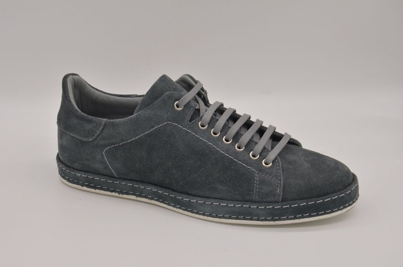 Modern Charcoal Suede Mens Sneaker With Distinctive Contrast Stitching - Quality Leather Product Manufactured By Çetsan Ayakkabı Sanayi Ve Ticaret Limited Şirketi. Contact For B2B Orders.