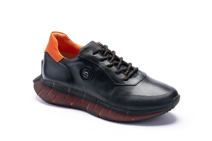 Modern Leather Sneaker With Bold Orange Details - Quality Leather Product Manufactured By Karar Ayakkabicilik Deri Mamulleri San. Ve Tic. Ltd. Sti. Contact For B2B Orders.