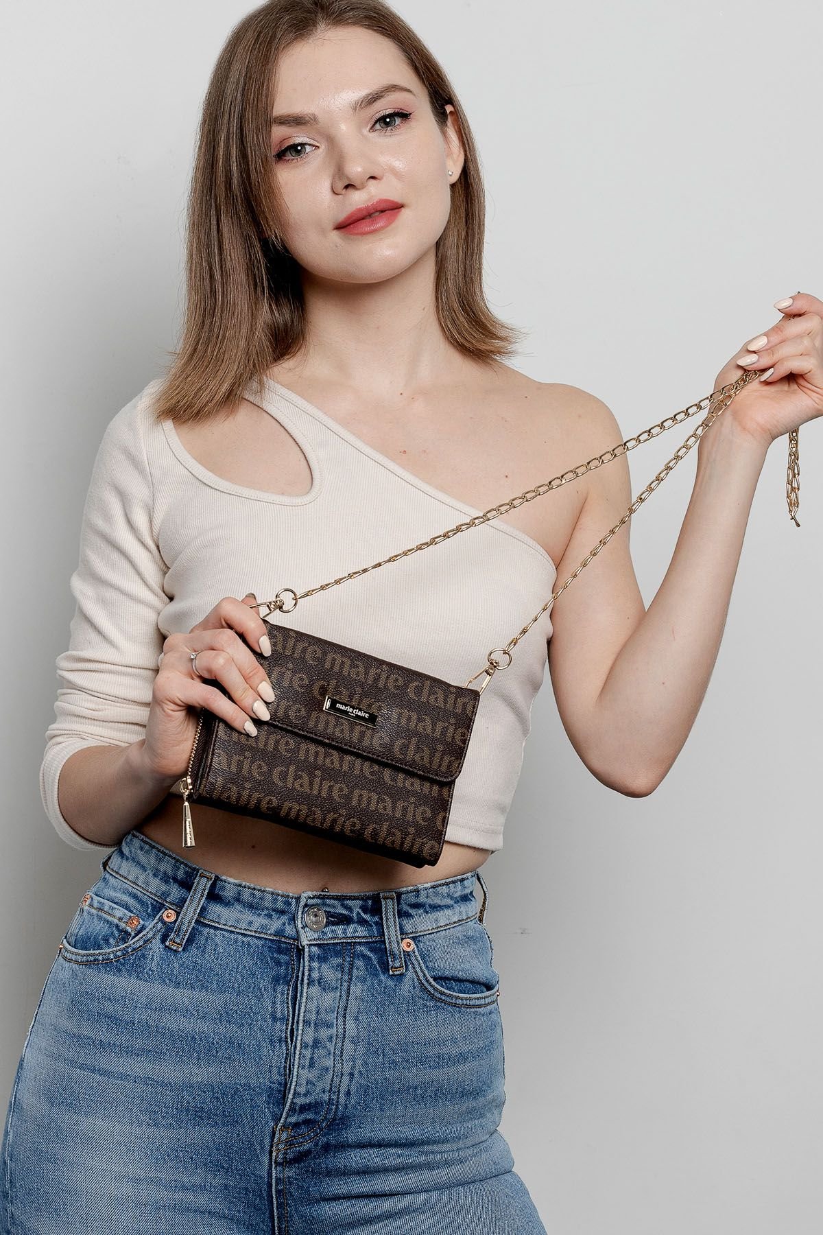Marie Claire Brown Logo Pattern Crossbody Bag - Quality Leather Product Manufactured By Eda Trend Moda Anoni̇m Şi̇rketi̇. Contact For B2B Orders.