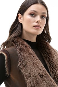 Womens Genuine Shearling Vest With Plush Fur Trim - Quality Leather Product Manufactured By Simge Deri Tekstil San. Tic. Ltd. Şti. Contact For B2B Orders.