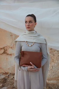 Sophisticated Grained Leather Wristlet Clutch - Quality Leather Product Manufactured By Gundogdular Deri San. Tic. Ltd. Sti.. Contact For B2B Orders.