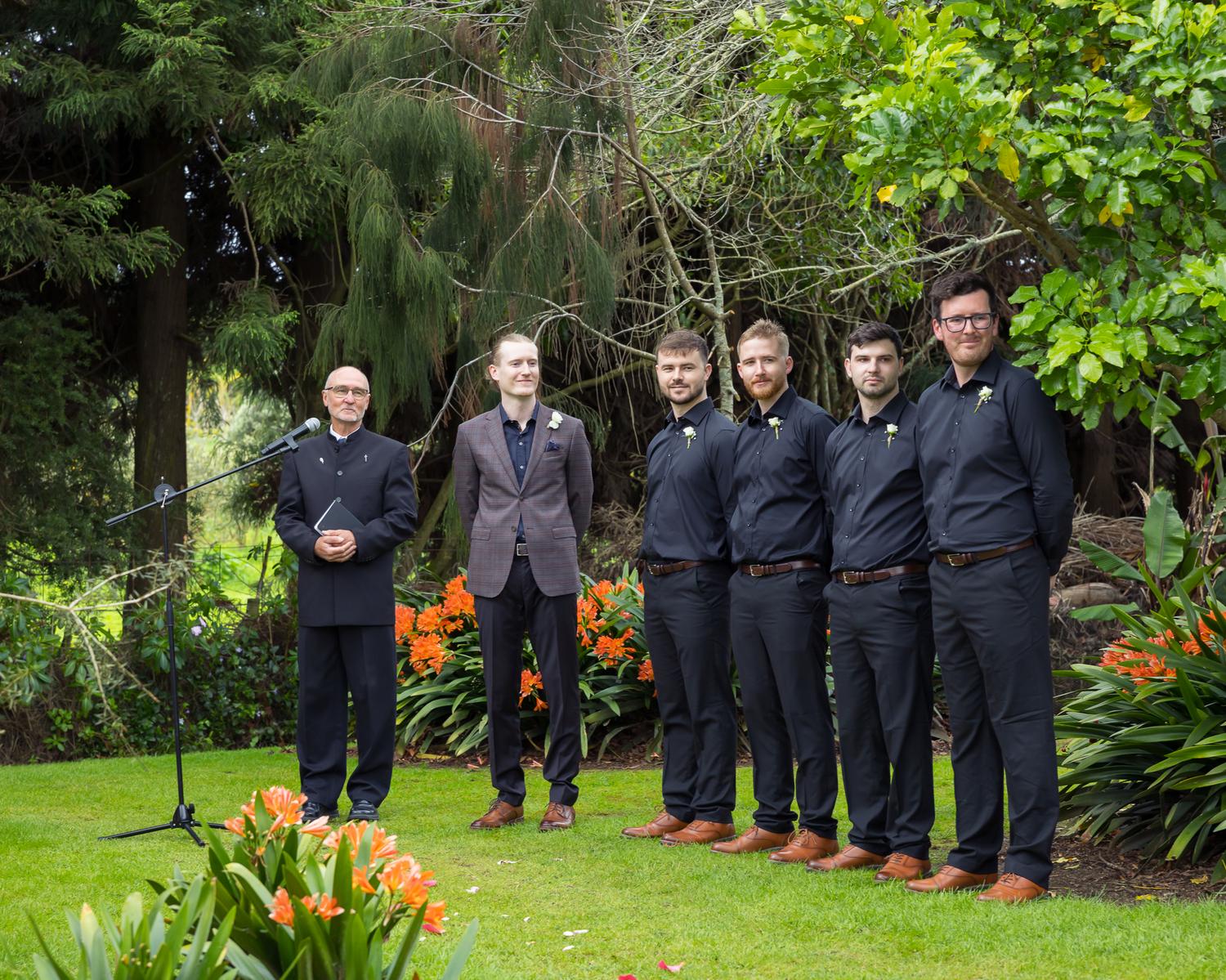 Connor and his groomsmen wait in the garden