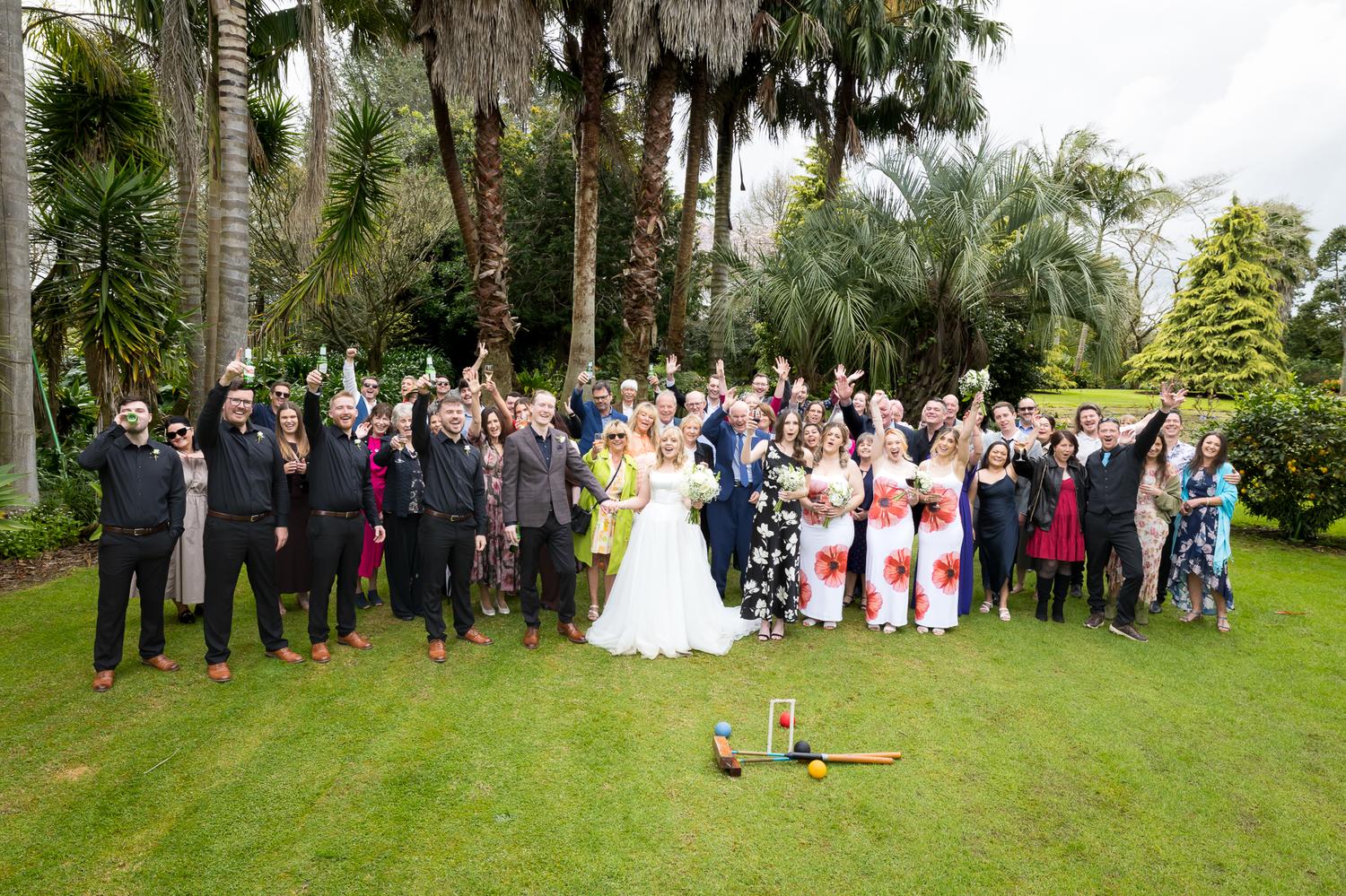 All the guests gathered on the lawn for a group photo