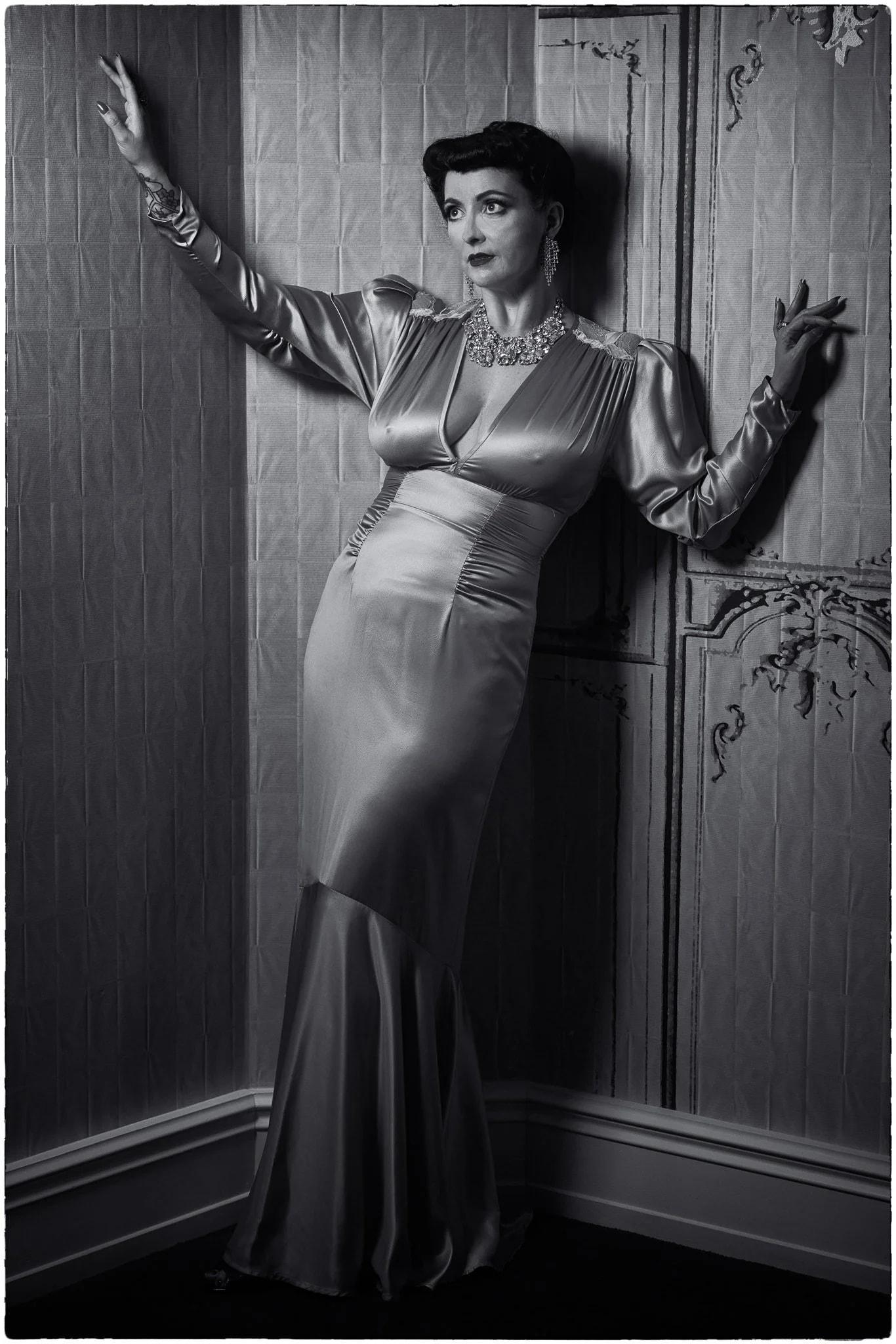 Black and white photo of Viv in a satin gown