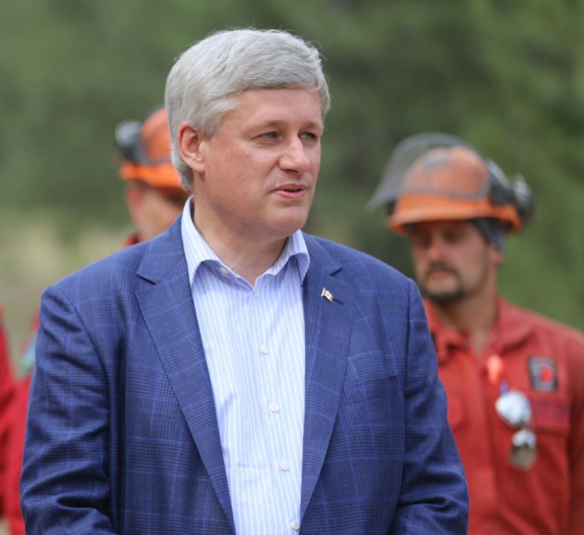 Prime Minister Harper is pictured at a press conference about BC's wildfires in July. (Photo Credit: KelownaNow.com)