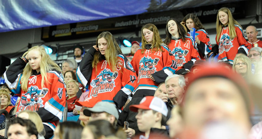 <who>Photo Credit: Lorne White/KelownaNow.com </who>Members of the Kelowna Minor Hockey Association bantam A Rockets head to their seats at the start of the second period of the IIHF world championship game at the Sandman Centre on Monday. The girls are competing in the BC Hockey championship tournament in Kamloops this week.
