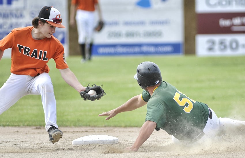 <who>Photo Credit: Lorne White/KelownaNow </who> Brandon Graham of the Okanaga Collegiate Athletics is tagged out at second base in the second of three games against the Trail Orioles on the weekend.