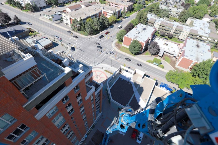 A shot from the top of the 180ft boom lift offers passengers an excellent view of the Centuria buildings and surrounding Kelowna.