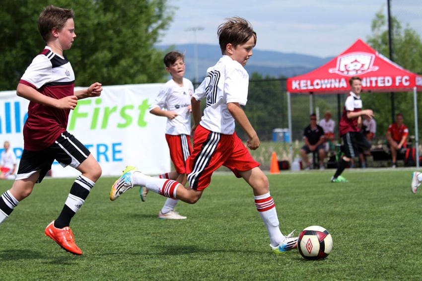 <who>Photo Credit: Contributed </who>Bradley Neal and Matteo Bigattini go on the offensive for the Kelowna United U12 Legends.