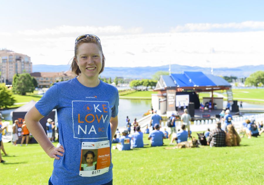 <who> Lauren May poses for a portrait before the World Vision Global 6K for Water event at Tugboat Bay in Downtown Kelowna on Sat. July 7, 2018. May has sponsored a child since 2012 through World Vision. Photo Credit:NowMedia.</who>