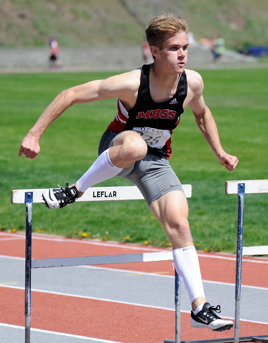 <who>Photo Credit: Lorne White/KelownaNow </who>On his way to the Simon Fraser University Clan track and field team next season, Mt. Boucherie's Noah Russell won both the Valley's 110- and 400-metre hurdle events at Hillside Stadium in Kamloops.