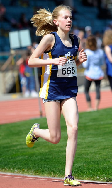 <who>Photo Credit: Lorne White/KelownaNow </who>Ella Rolleston of OKM ran to first in junior 3,000 metres.