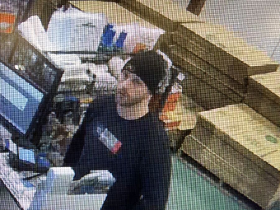 Police are still looking for another suspect (pictured)