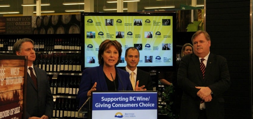 <who> Photo Credit: KelownaNow </who> Premier Christy Clark speaks at Save-on-Foods in Kelowna. The store will allow customers to buy B.C. wines while grocery shopping. 