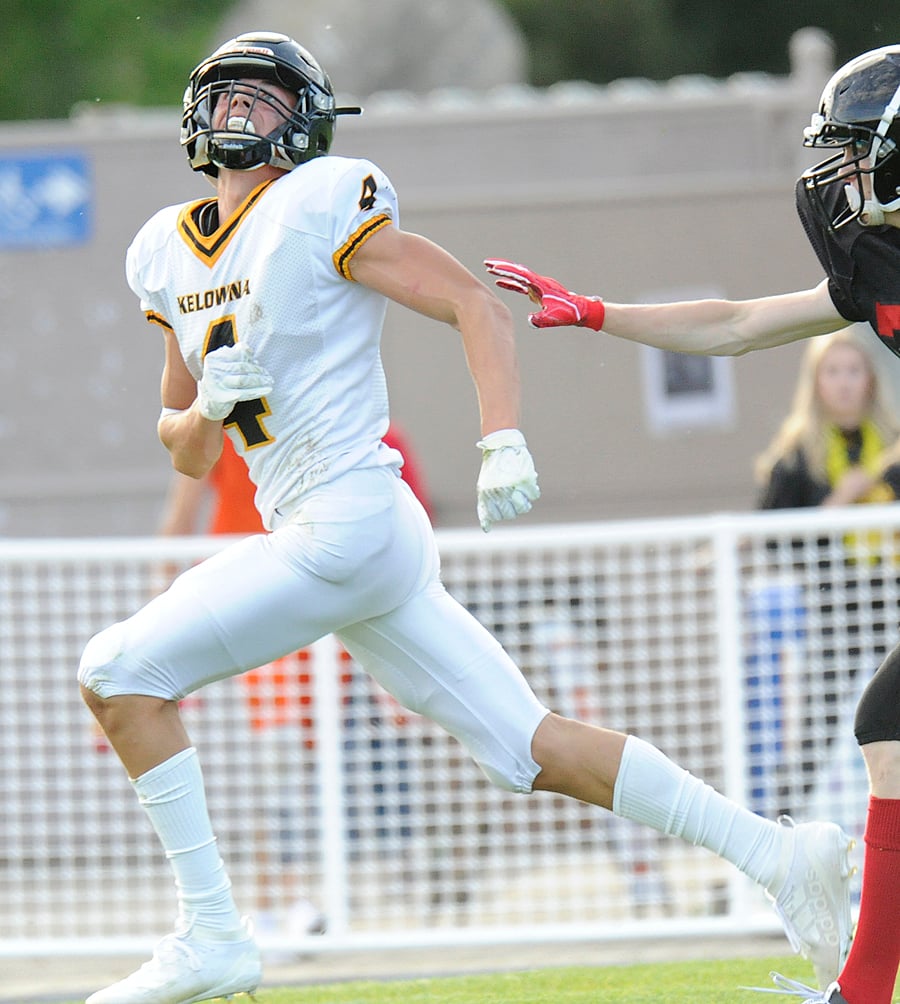 <who>Photo Credit: Lorne White/KelownaNow </who>Caeleb Schlachter's touchdown catch and forced fumble highlighted Owls' comeback.