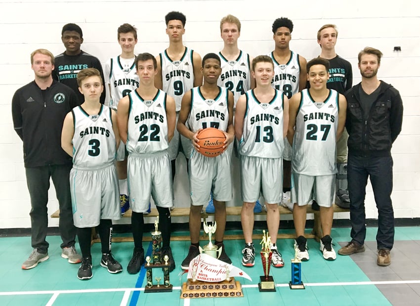 <who>Photo Credit: Contributed </who>Competing in their first-ever B.C. School Sports provincial A boys basketball championship, the Heritage Christian School Saints opened with a win over the Mulgrave Titans of West Vancouver. Members of the Saints, the 2017 Okanagan Valley champions, are, from left, front: Colton Tripke (coach), Matthew Van Fleet, Jordan Nenasheff, Raymond Barrett, Ben Robideau, Josh Weekes and Dave Hennes (coach). Back: Timi Akindele, Colton St. Pierre, Isaac Opuma, Sam Bell, Isaiah Akurienne and Mark Bell. 