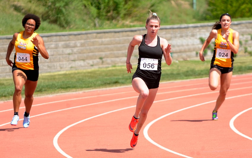 <who>Photo Credit: Lorne White/KelownaNow </who>Kelowna Secondary School's Bryn Walsh, centre, raced to victory in the Central Okanagan zone's senior girls 200-metre race. On the left is KSS teammate Kenaysha Lyder (second) and on the right is the Owls' Ava Bakala (third).