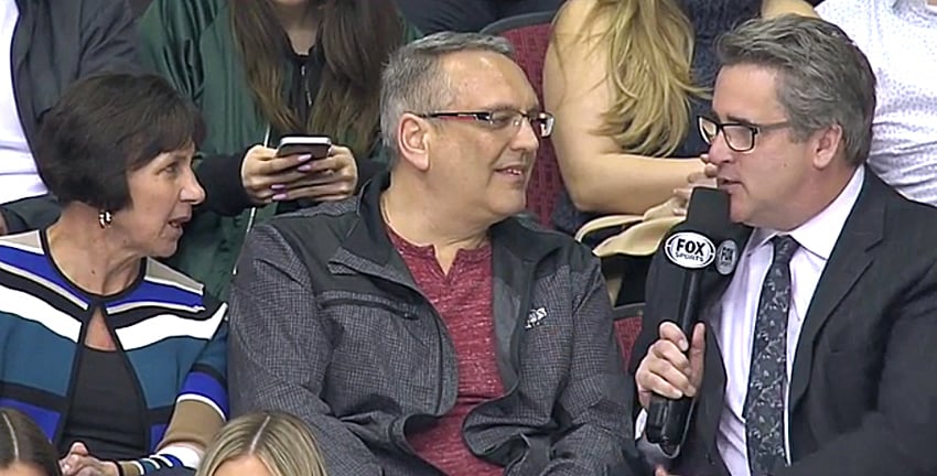 <who>Photo Credit: Fox Sports </who>Aline and John Guidolin of Kelowna, Merkley's billet parents during his four years with the Kelowna Rockets, were on hand to watch him play his first NHL game. They were interviewed by Fox Sports' Todd Walsh during the game. 