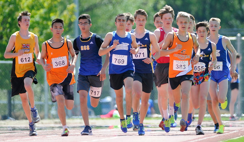 <who>Photo Credit: Lorne White/KelownaNow </who>The Central Okanagan junior and senior boys 1,500-metre events were won by Jasper Stone of Aberdeen Hall and Turner Woodroof of the OKM Huskies respectively.
