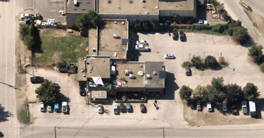 <who> Photo Credit: City of Kelowna staff report </who> The proposed permanent patio would be located on the grassy area on the south side of the property.