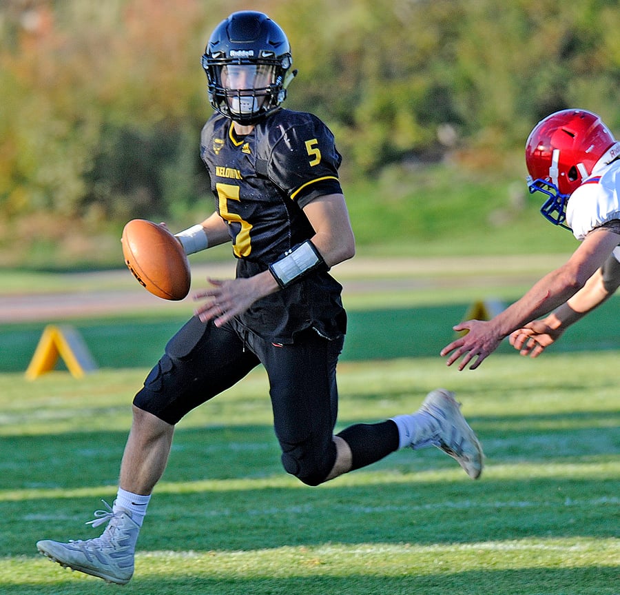 <who>Photo Credit: Lorne White/KelownaNow </who>Nathan Beauchemin completed 12 passes for 210 yards and three touchdowns in the Kelowna Owls' first win ever over the Terry Fox Ravens.