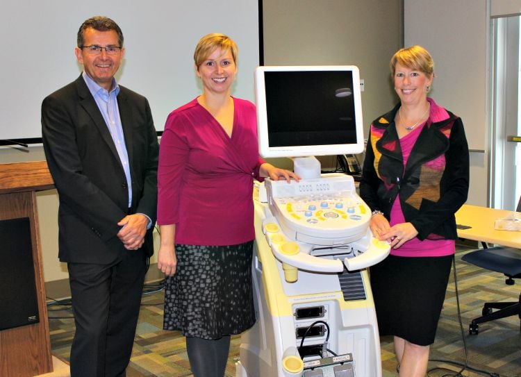 <who> Photo Credit: contributed. </who> Doug Rankmore, Claire Johnston and Dr. Carla Nash with new ultrasound unit. 