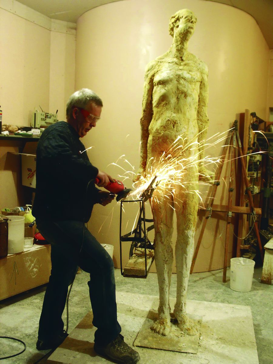 <who>Photo Credit: Michael Hermesh</who> Michael Hermesh creating Frank the Baggage HandlerRestoration and Resilience at Lars Baggenstos' studio