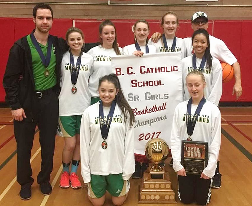<who>Photo Credit: Contributed </who>The Immaculata Mustangs won their third consecutive B.C. Catholic senior girls basketball championship on the weekend in Surrey. Members of the team are, from left, front: Tia Routley and Mikhaela Holroid. Back: Andrew Gini (coach), Katarina Routley, Gabby Cocar, Kate Johnson, Ashlyn Day, Justin Puno and Dino Gini. Missing: Teaghan Wallace.