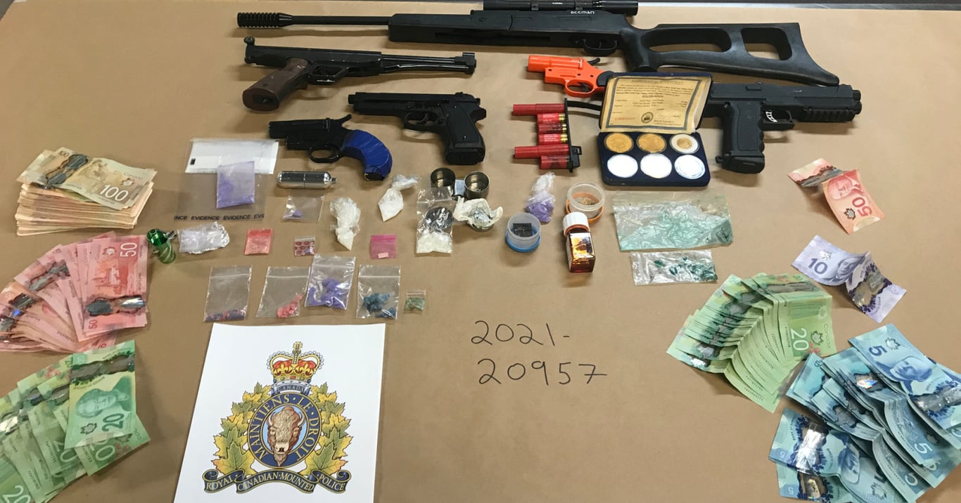 RCMP seizes drugs, weapons and cash from Kelowna residence