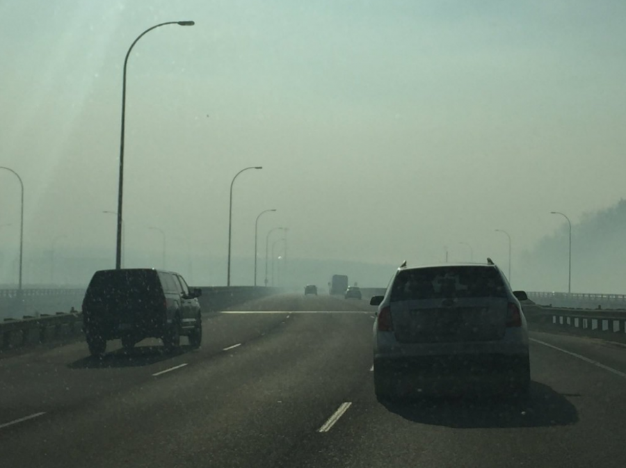 <who> Photo Credit: @RobichaudMs/ Twitter </who> Smoke blankets the region.