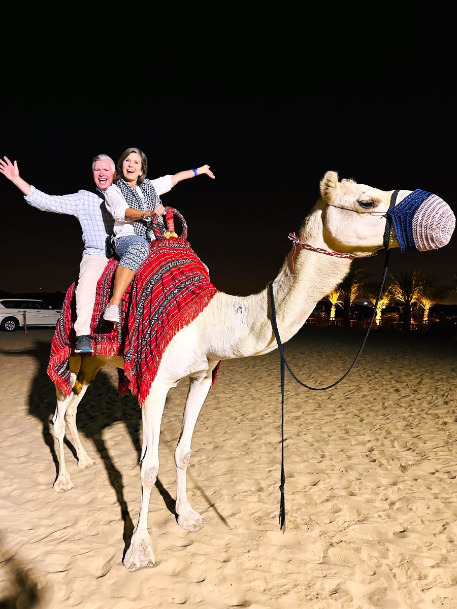 </who>Steve and Kerry MacNaull atop Sultan the camel.