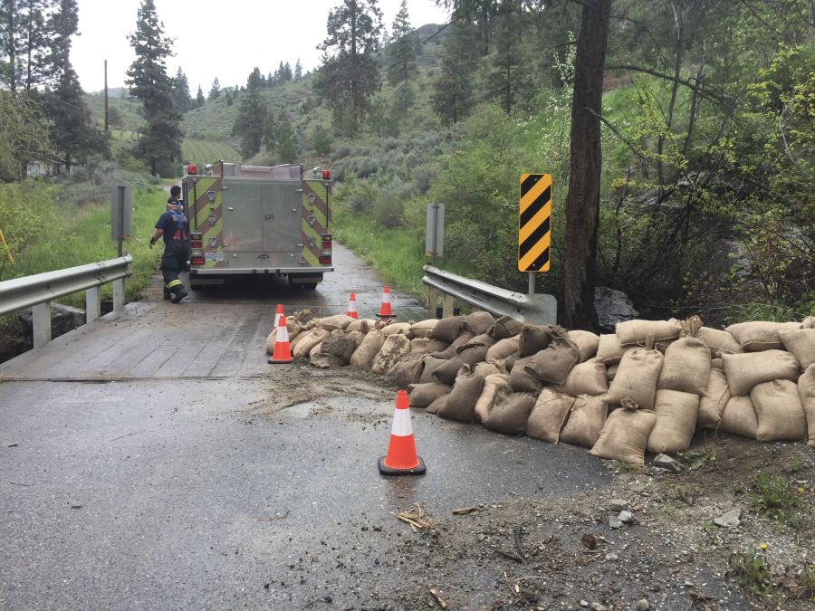 <who>Photo Credit: CCSS</who> The bridge in its flooded state