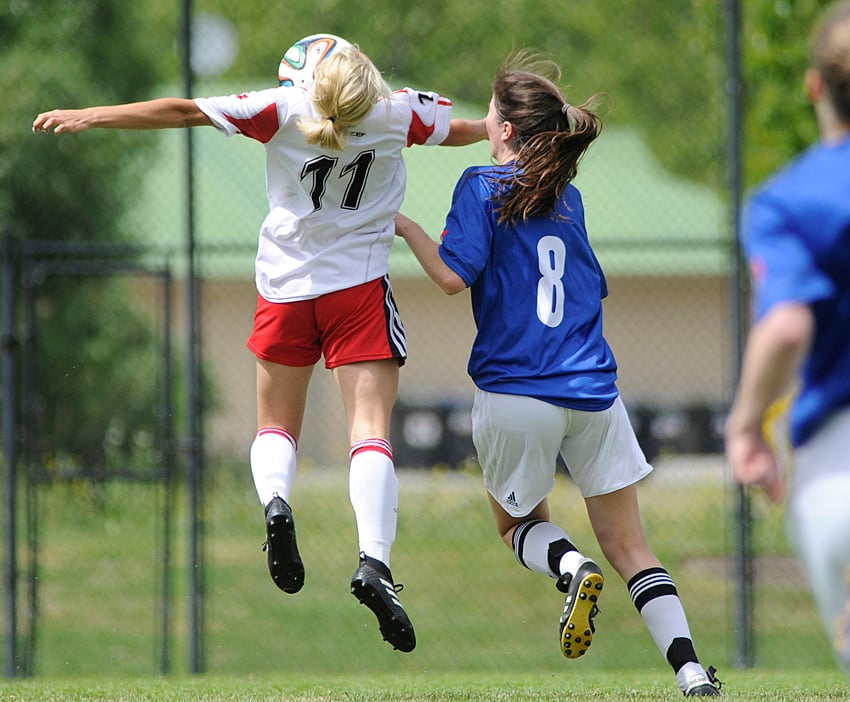 <who>Photo Credit: Lorne White/KelownaNow </who>Megan Sekella of the Kelowna United U18s leaps to chest the ball in their TOYSL final against Penticton on Sunday.