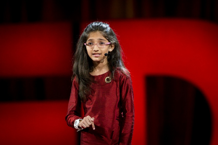 Young writer Ishita Katyal addresses the crowd on Monday.