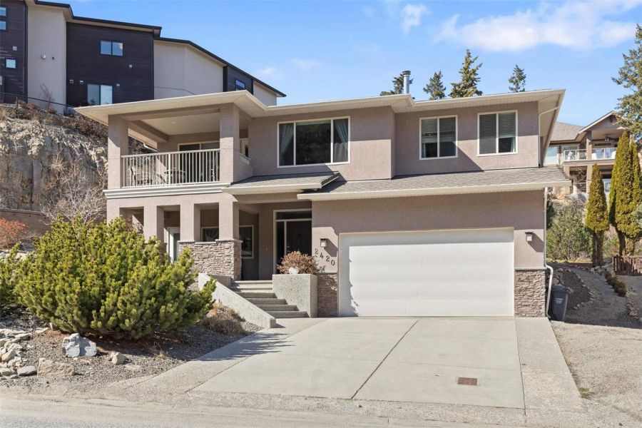 </who>This four-bedroom, three-bathroom home on Dilworth Mountain is listed for sale for $1,050,000, which is just a little less than the $1,063,800 benchmark selling price for a typical single-family home in Kelowna in June.