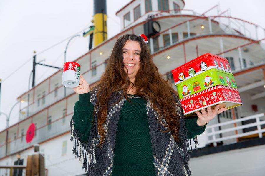 <who>Photo Credit: NowMedia</who> SS Sicamous Society's Katie Pereira bearing gifts